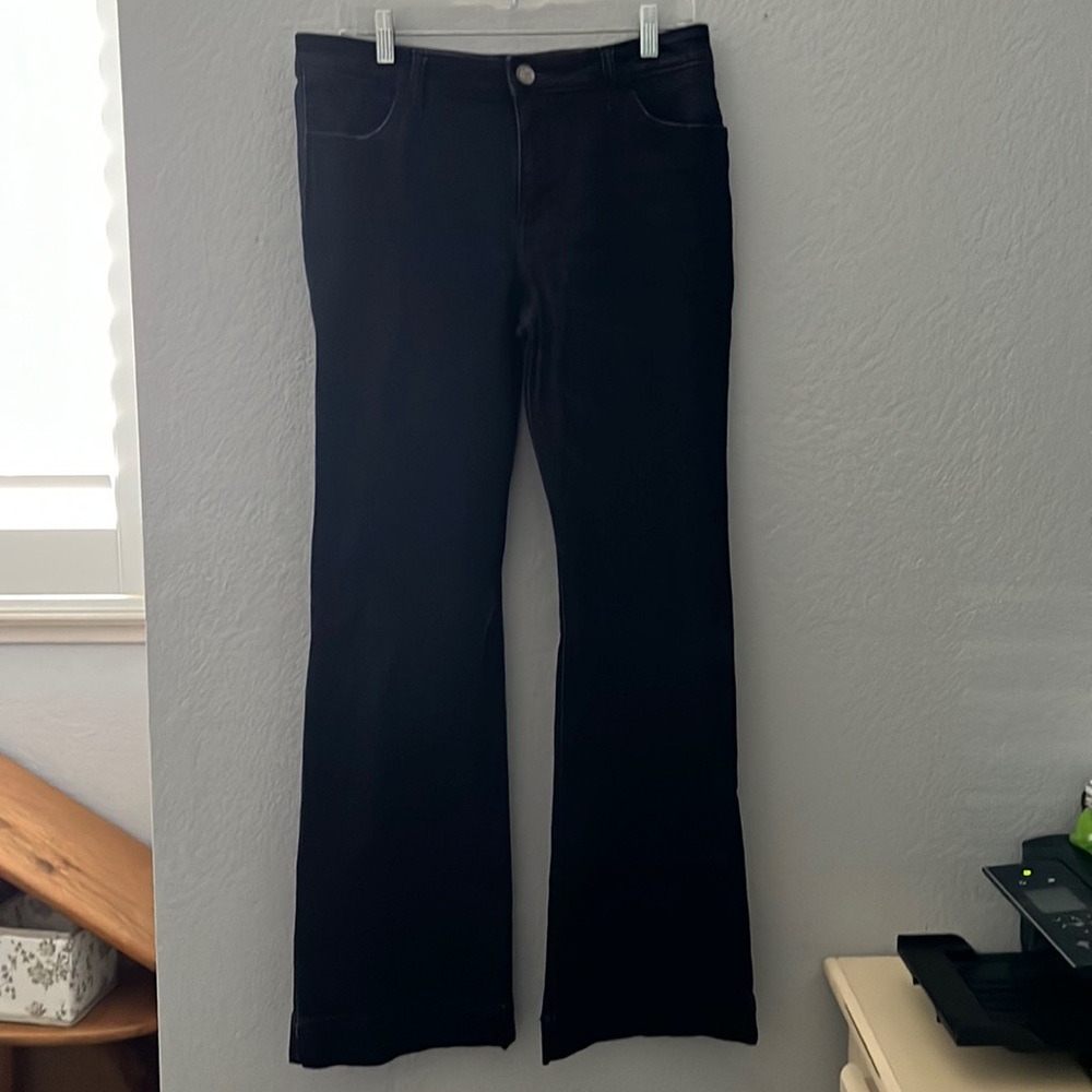 Used in new condition Flare Wrangler jeans size 11/12 32 in inseam